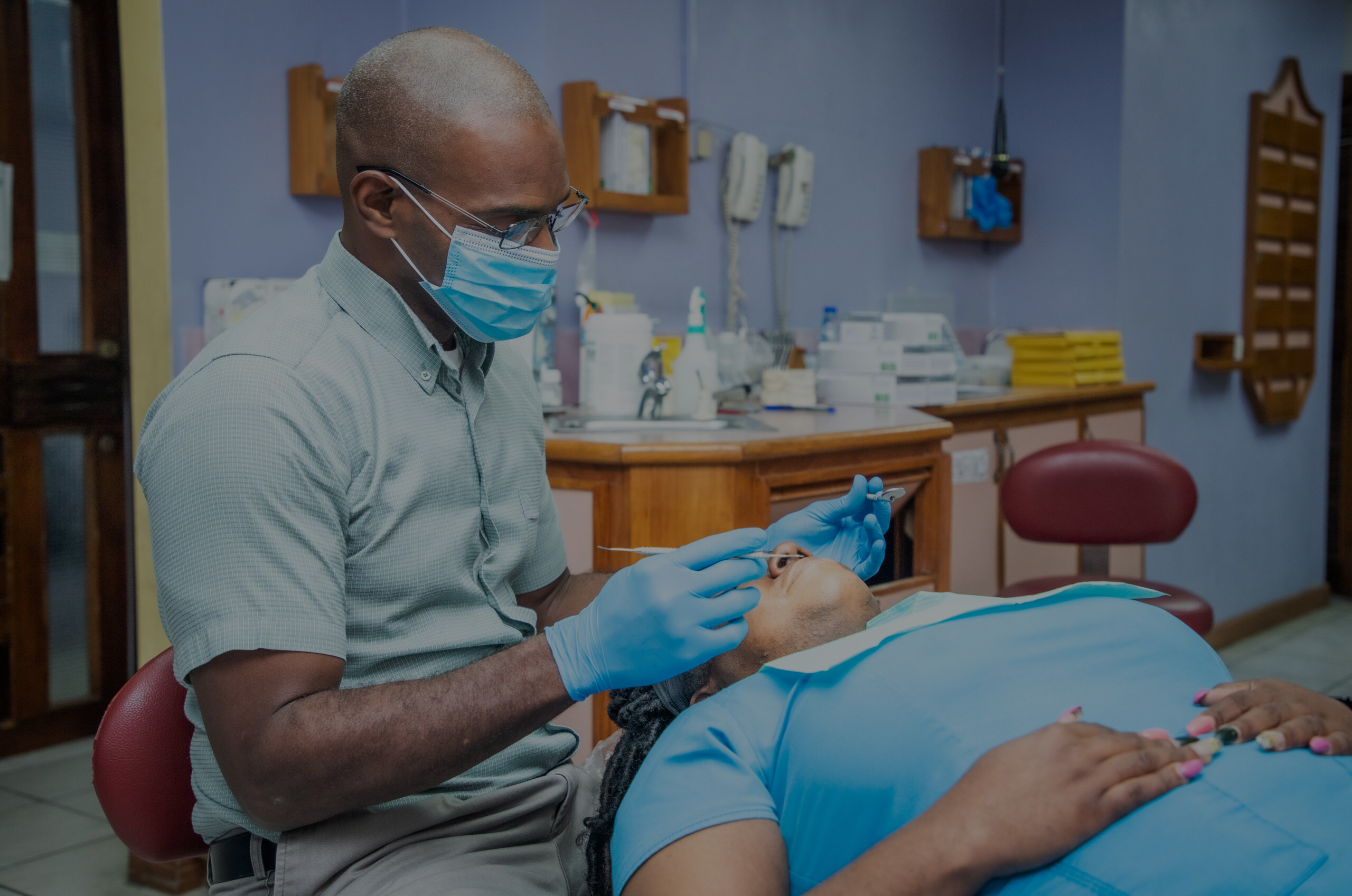 Dentist attending to patient